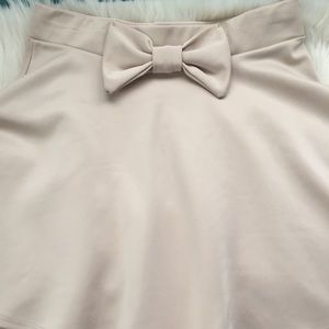 Nude/Cream Colored Skater Skirt With Bow